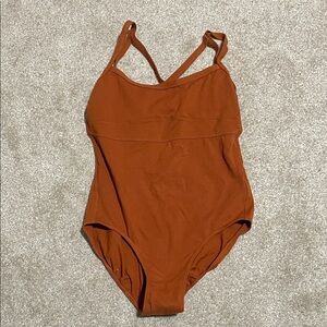 Danskin Rust colored bodysuit with Crossback Straps